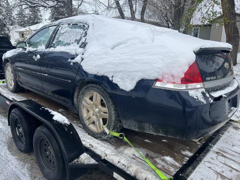 GetMyScrapCar | Junk Car Removal of a Chevrolet Impala in Winter Conditions