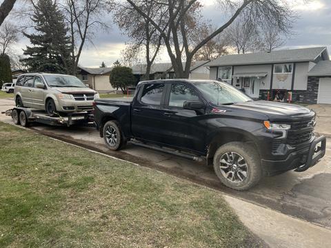 GetMyScrapCar | Junk Car Removal with Chevrolet Silverado Towing a Scrap Vehicle