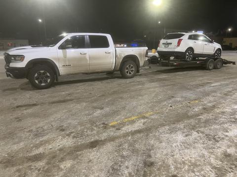 GetMyScrapCar | RAM Truck Towing Scrap Car for Recycling