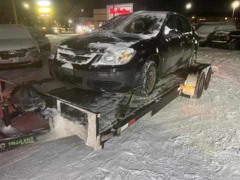 GetMyScrapCar | Junk Car on Trailer for Scrap Metal Recycling