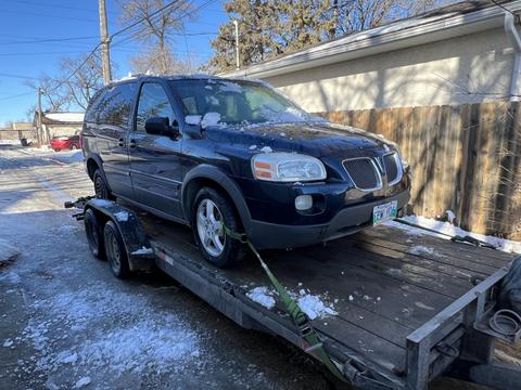 GetMyScrapCar | 2007 Pontiac Montana on Trailer for Scrap Car Removal