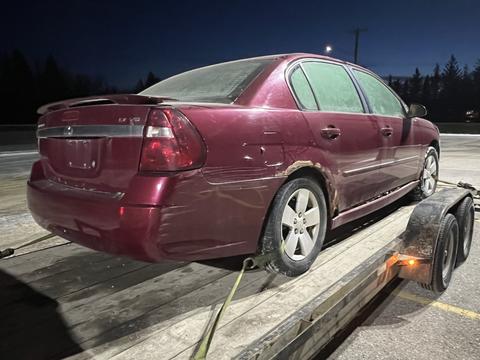 GetMyScrapCar | Junk Car Removal of a Ford Taurus for Scrap Metal Recycling