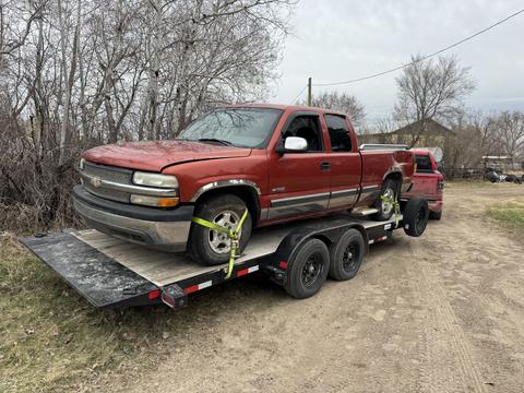 GetMyScrapCar | Red Chevrolet Truck on Trailer for Scrap Metal Recycling