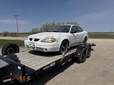 GetMyScrapCar | Pontiac Grand Am on Trailer for Scrap Car Removal