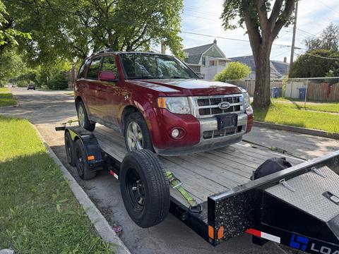GetMyScrapCar | Ford Escape on Trailer for Junk Car Removal
