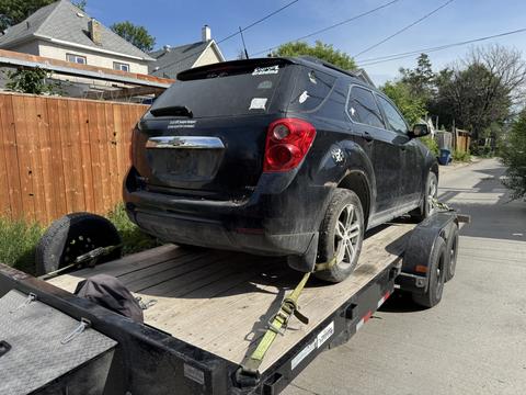 GetMyScrapCar | Scrap Chevy Equinox on Tow Trailer for Junk Car Removal