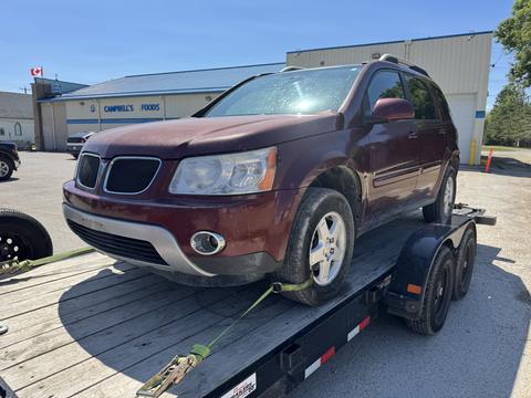GetMyScrapCar | Junk Car Removal for a Pontiac Torrent on a Trailer