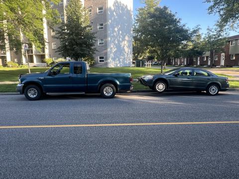 GetMyScrapCar | Junk Car Removal of a Blue Pickup and Silver Sedan for Recycling