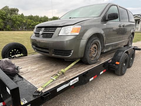 GetMyScrapCar | Dodge Caravan on Trailer for Junk Car Removal