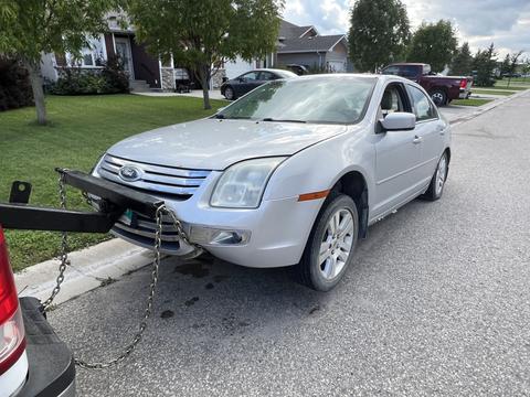GetMyScrapCar | Scrap Ford Sedan for Junk Car Removal and Recycling
