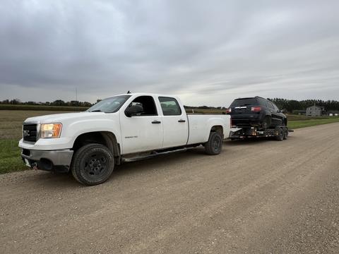 GetMyScrapCar | GMC Truck Towing Junk Car for Scrap Metal Recycling