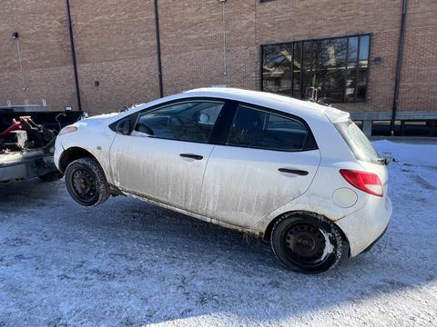 GetMyScrapCar | Junk Car Removal of a Scrap White Hatchback